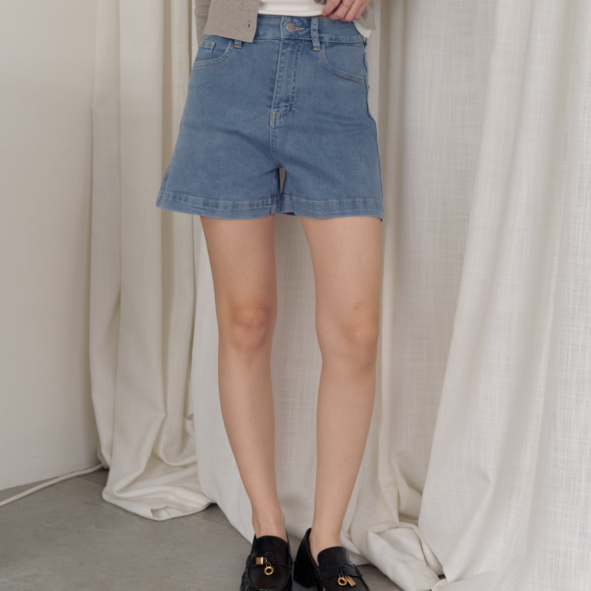 Emma Stretchy High Waisted Denim Shorts in Mid Wash