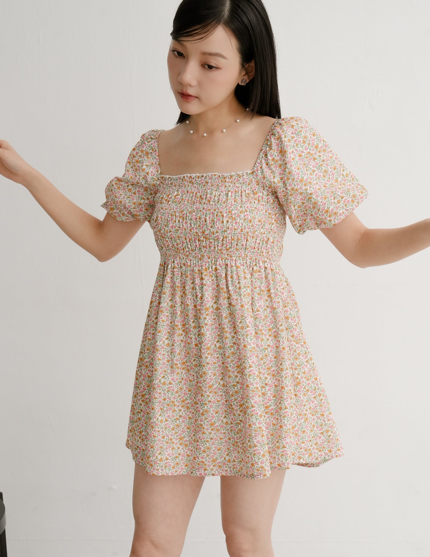 Nola Smocked Babydoll Dress in Sunset Garden